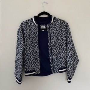 Navy and white bomber jacket.